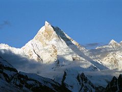 17 Yermanendu Kangri, Masherbrum, Mandu Peak Just After Sunrise From Goro II Masherbrum marks the high point of an east-west running ridge that includes Yermanendu Kangri (7163m) on the left and Mandu Peak (7127m) on the right.